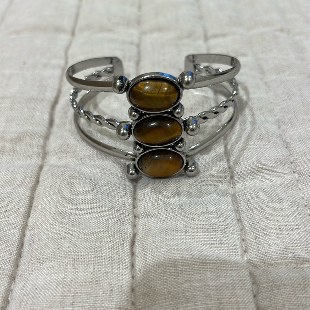 Silver cuff bracelet with brown stones
